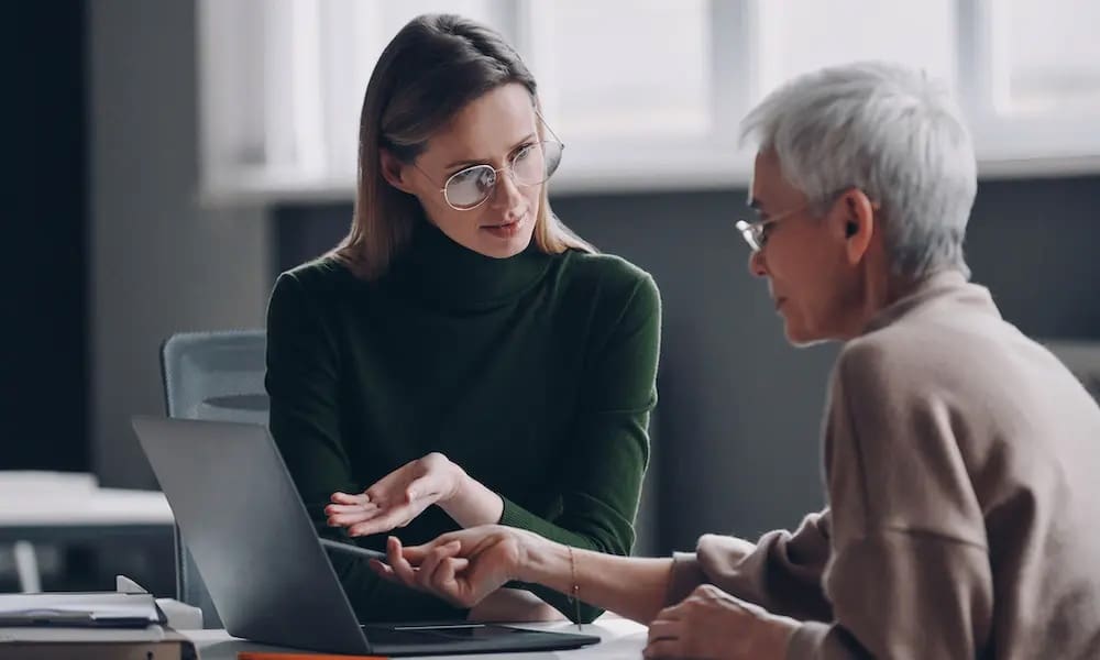 Navigating-a-Challenging-Market-3-Steps-to-Help-You-Manage-Your-Personal-Insurance-Renewals-with-McConkey-Insurance-Benefits-Client-Discussing-Insurance-With-Thier-Agent-